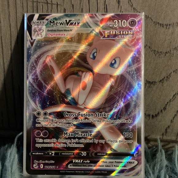 Ultra rare Mew VMAX Trading Card - Holographic Pink and Blue
